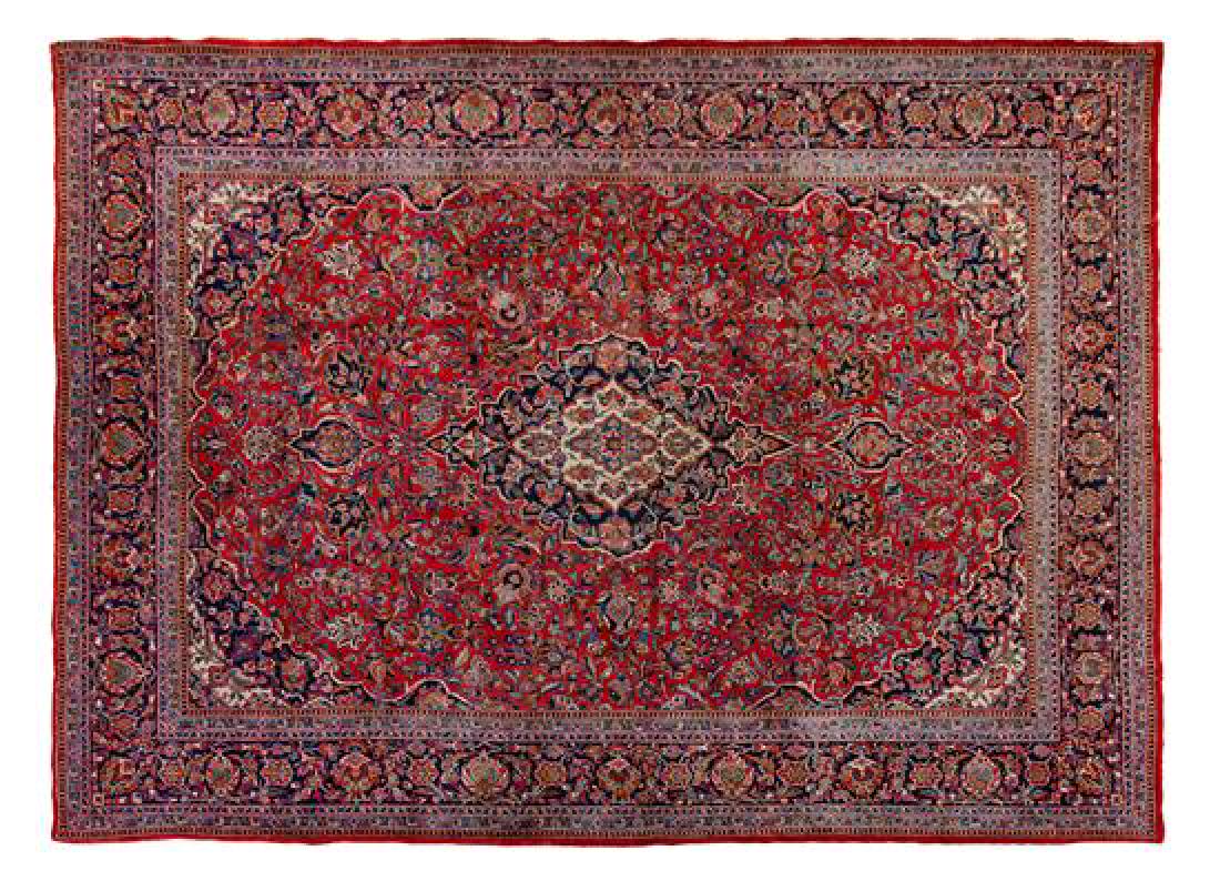 A Kashan Wool Rug 12 feet 3 inches x 9 feet 1 inch. (1 of 1)