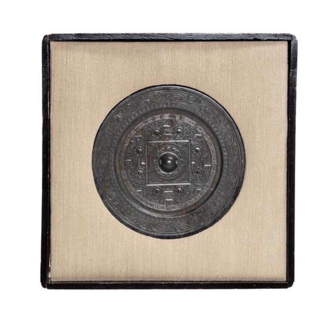 A Bronze 'TLV' Mirror Diameter 7 1/2 inches. (1 of 1)