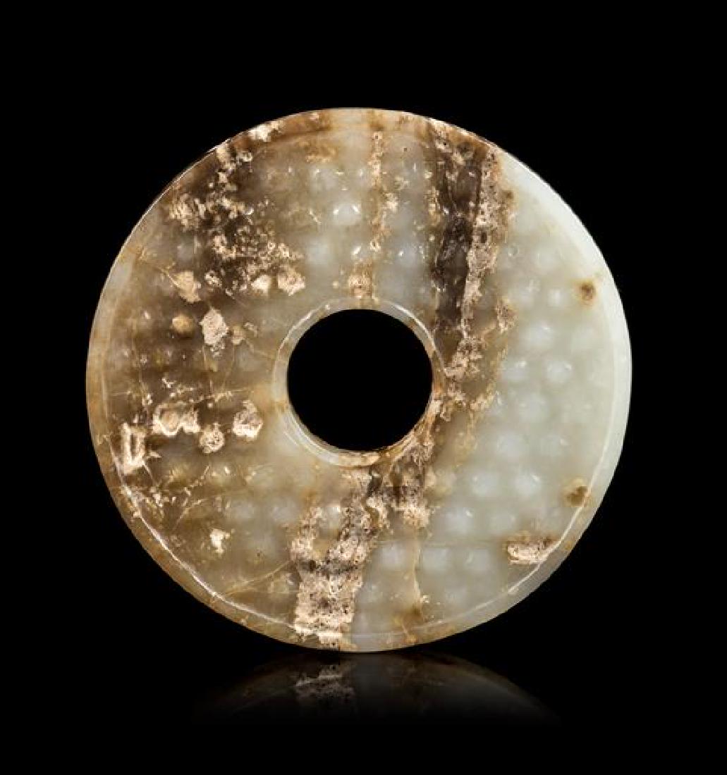 A Jade Bi Disc Diameter 2 3/4 inches. (1 of 2)