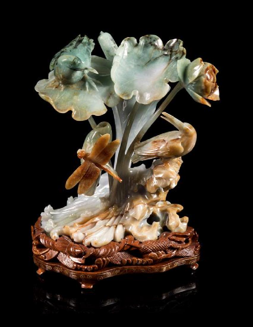 * A Green, Russet and Pale Celadon Jadeite Figural (1 of 1)