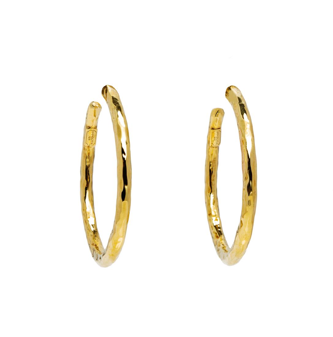 * A Pair of 18 Karat Yellow Gold Hoop Earrings,: * A Pair of 18 Karat Yellow Gold Hoop Earrings, Ippolita, measuring approximately 43.00 mm wide, with hammered finish. Stamp: IPPOLITA 18K. 5.30 dwts. Estimate $200-400 Property from The Violet Soffer