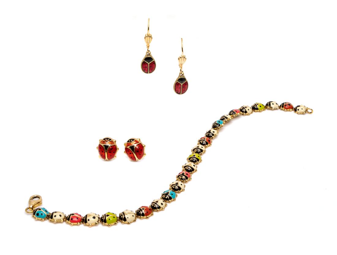 A Collection of 14 Karat Yellow Gold and Enamel: A Collection of 14 Karat Yellow Gold and Enamel Jewelry, consisting of four gold bracelets containing ladybug links with multicolor enamel, one yellow gold necklace consisting of cable link chain inte