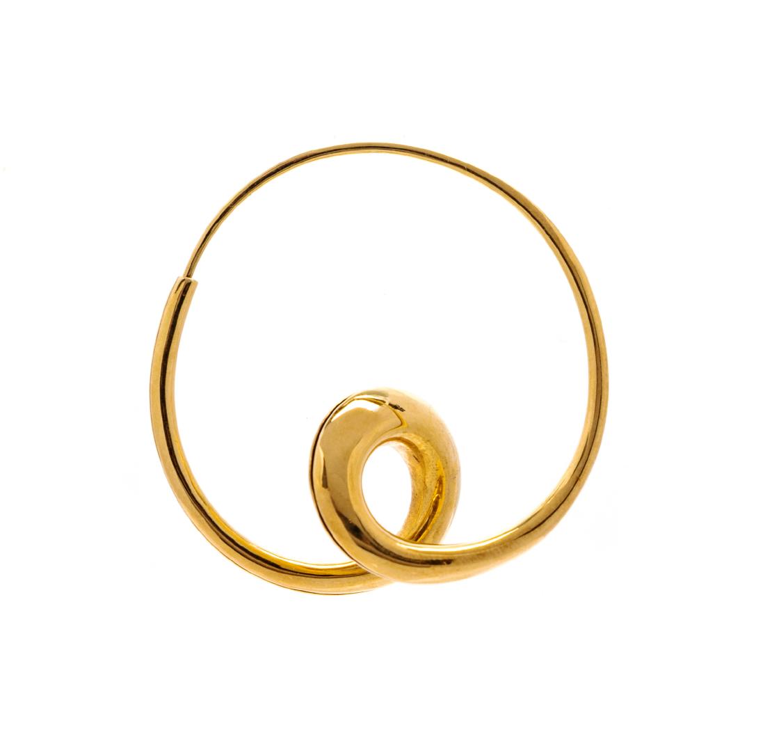 * An 18 Karat Yellow Gold Brooch, Michael Good, 2.70: * An 18 Karat Yellow Gold Brooch, Michael Good, designed in an endless swirling style. Stamp: 18K MG. 2.70 dwts. Estimate $100-200 Property from The Violet Soffer Trust, Boca Raton, Florida Please con