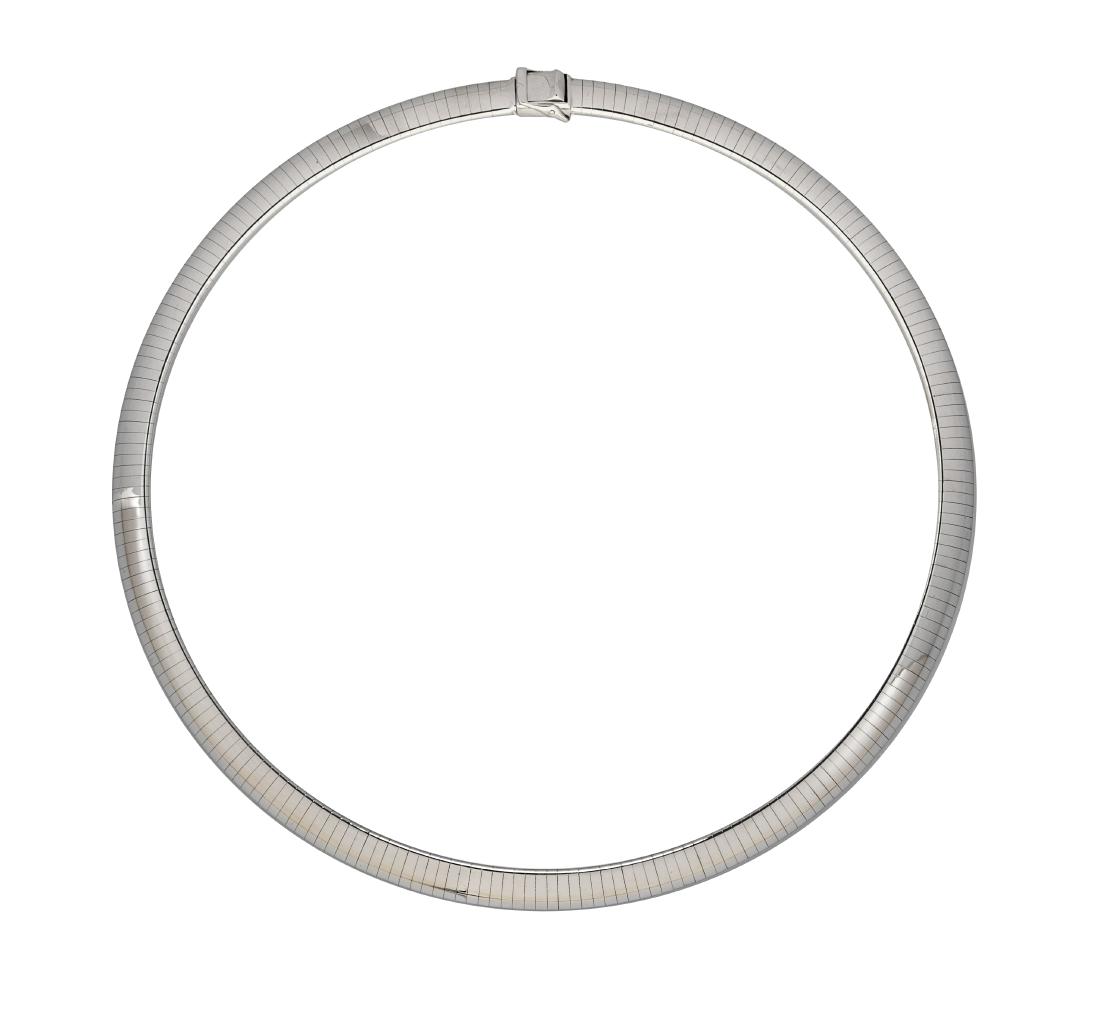 * A 14 Karat White Gold Omega Necklace, 33.50 dwts.: * A 14 Karat White Gold Omega Necklace, measuring approximately 8.00 mm wide. Stamp: Italy 14Kt ITALY QG. 33.50 dwts. Estimate $800-1,200 Property from The Violet Soffer Trust, Boca Raton, Florida Ple