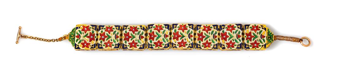 * A Mughal High Karat Yellow Gold, Gemstone and Enamel: * A Mughal High Karat Yellow Gold, Gemstone and Enamel Bracelet, consisting of rectangular links containing foil-backed cabochon cut gemstones in floral motif, the backs with polychrome enamel floral 