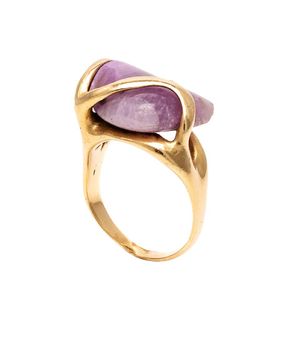 * A Yellow Gold and Amethyst Ring, 6.50 dwts.: * A Yellow Gold and Amethyst Ring, consisting of one tumbled amethyst in a free form ring. 6.50 dwts. Estimate $100-200 Property from the Estate of Herta Cuneo, Sarasota, Florida Sold to Benefit The J