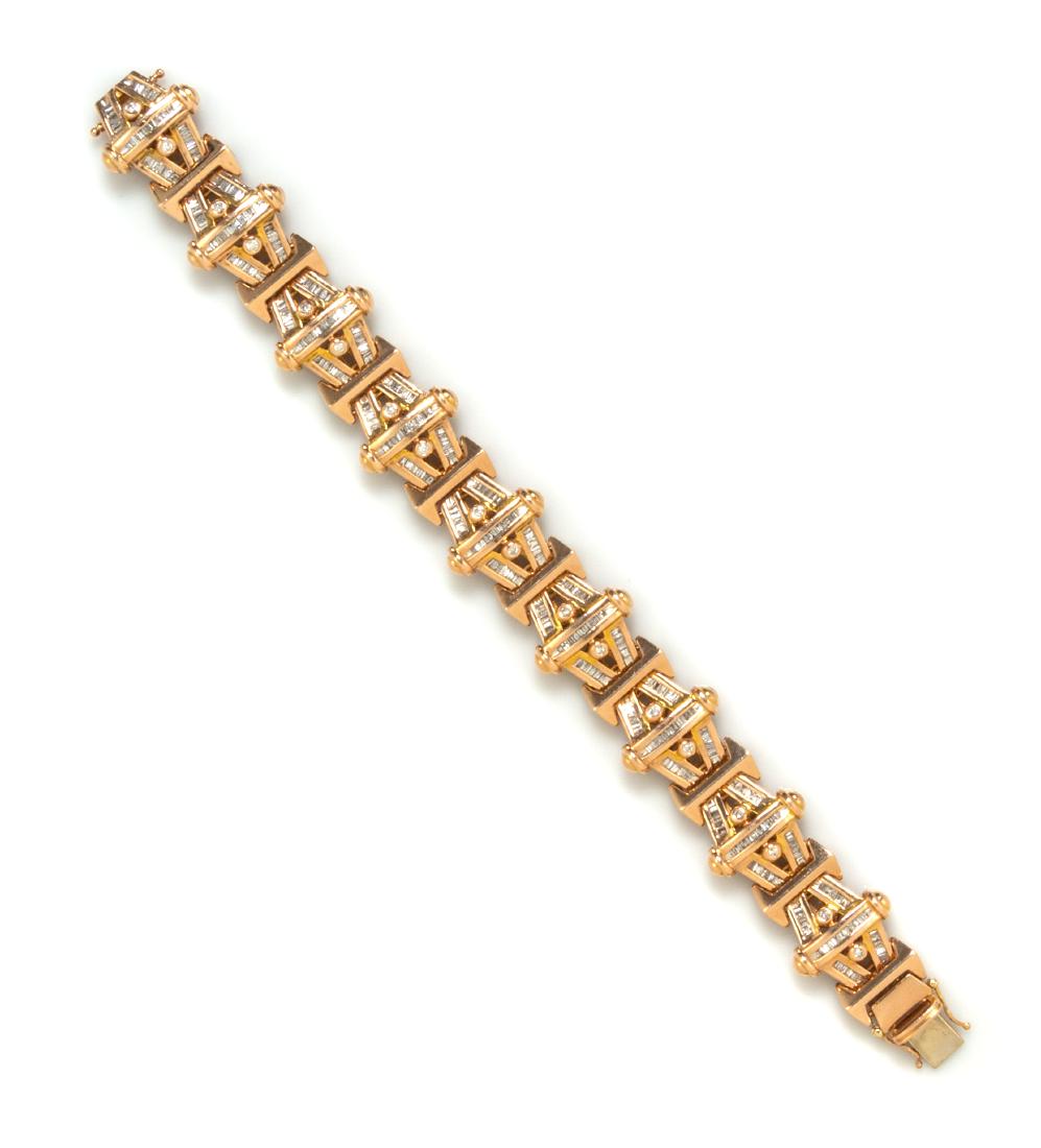 A 14 Karat Rose Gold and Diamond Bracelet, 42.40 dwts.: A 14 Karat Rose Gold and Diamond Bracelet, containing 18 round brilliant cut diamonds weighing approximately 0.28 carat total and numerous baguette cut diamonds weighing approximately 3.00 carats tota