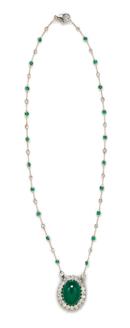 * A White Gold, Chalcedony, Diamond and Emerald Pendant: * A White Gold, Chalcedony, Diamond and Emerald Pendant Necklace, containing one oval shape cabochon cut dyed green chalcedony measuring approximately 19.80 x 14.90 x 7.95 mm, 21 round brilliant cut d
