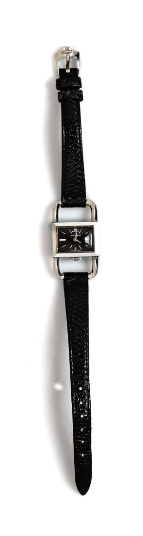 * A Stainless Steel Ref. 9041 'Padlock' Wristwatch,: * A Stainless Steel Ref. 9041 'Padlock' Wristwatch, Jaeger LeCoultre, 20.00 x 15.00 mm case dimensions excluding lugs, black dial signed JAEGER-LECOULTRE, applied steel baton numerals, steel pencil ha