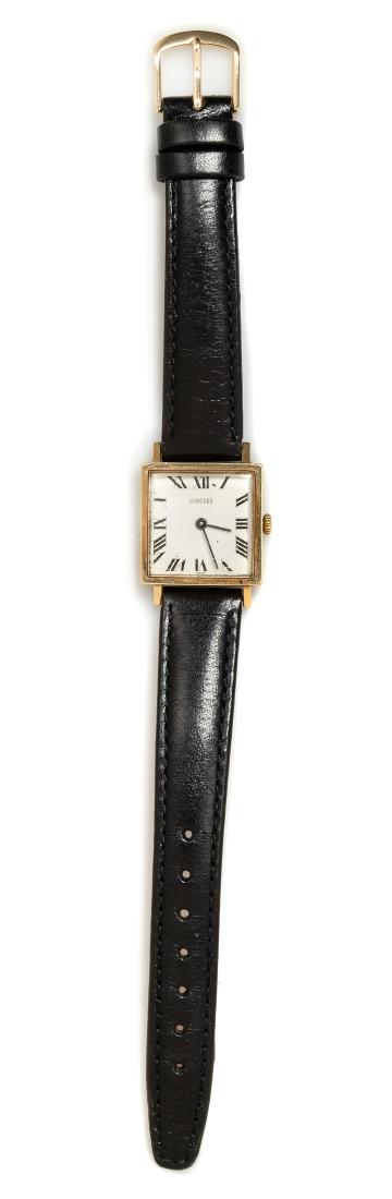 A 14 Karat Yellow Gold Wristwatch, Concord, 9.80 dwts.: A 14 Karat Yellow Gold Wristwatch, Concord, 21.00 x 21.00 mm case dimensions, matte silver dial signed CONCORD, black Roman numerals, black pencil hands, snap on case back, Cal. 316 17 jewel manual wi
