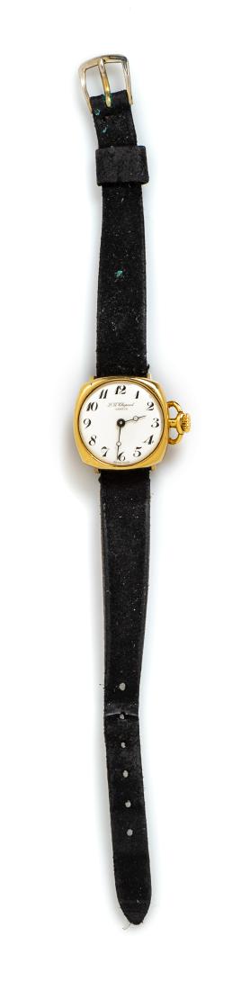 * An 18 Karat Yellow Gold Wristwatch, L.U. Chopard,: * An 18 Karat Yellow Gold Wristwatch, L.U. Chopard, 21.00 x 21.00 mm case dimensions, white dial signed L.U. Chopard, black Arabic numerals, steel moon hands, snap on case back, Cal. F4122 manual woun