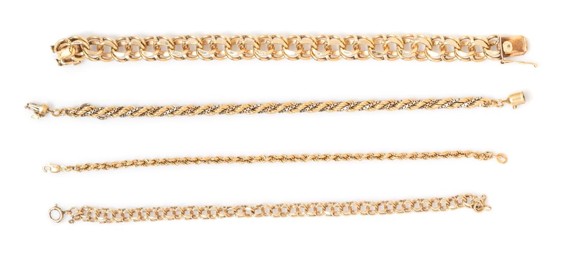 A Collection of Gold Chain Bracelets, 36.15 dwts.: A Collection of Gold Chain Bracelets, consisting of an 18 karat bicolor gold rope chain bracelet measuring approximately 5.00 mm wide, an 18 karat gold rope chain bracelet measuring approximately 3.00