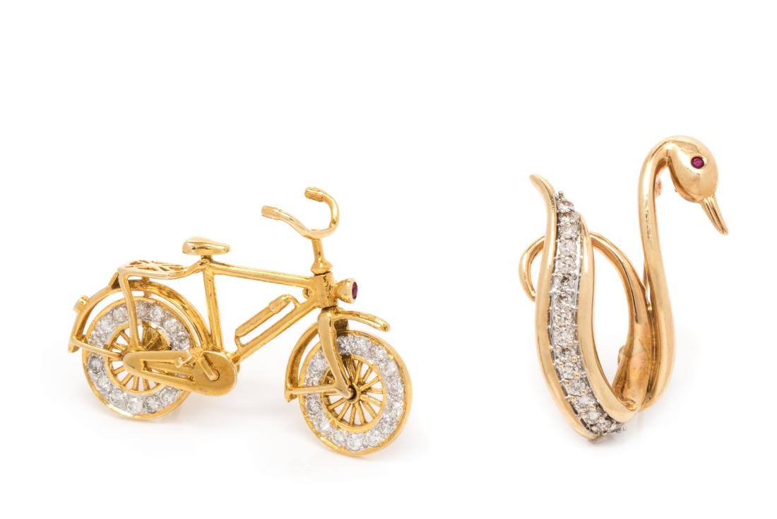 A Collection of 14 Karat Yellow Gold, Diamond and Ruby: A Collection of 14 Karat Yellow Gold, Diamond and Ruby Brooches, consisting of a swan motif brooch containing 16 round brilliant cut diamonds weighing approximately 0.40 carat total and one round mixe