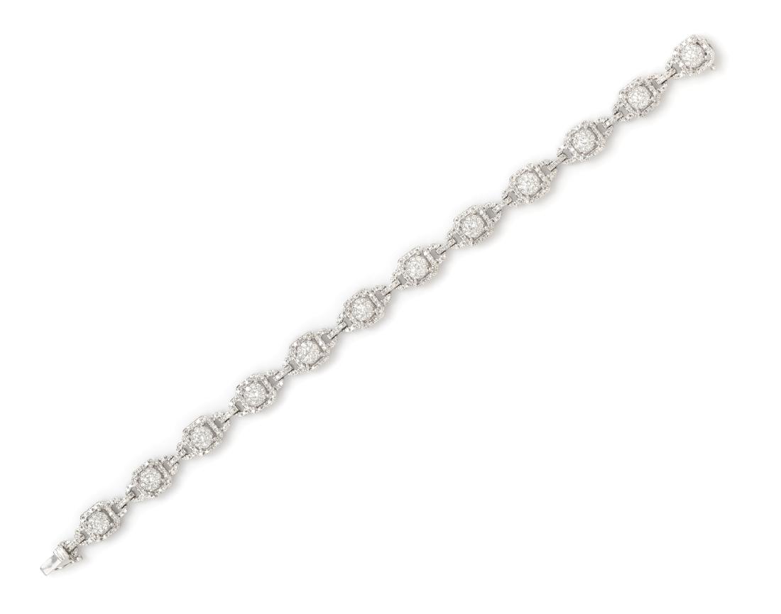 A 14 Karat White Gold and Diamond Bracelet, 11.00 dwts.: A 14 Karat White Gold and Diamond Bracelet, containing 439 round brilliant and single cut diamonds weighing approximately 2.85 carats total. Stamp: 14K MDJ. 11.00 dwts. Estimate $1,500-2,500 Please co