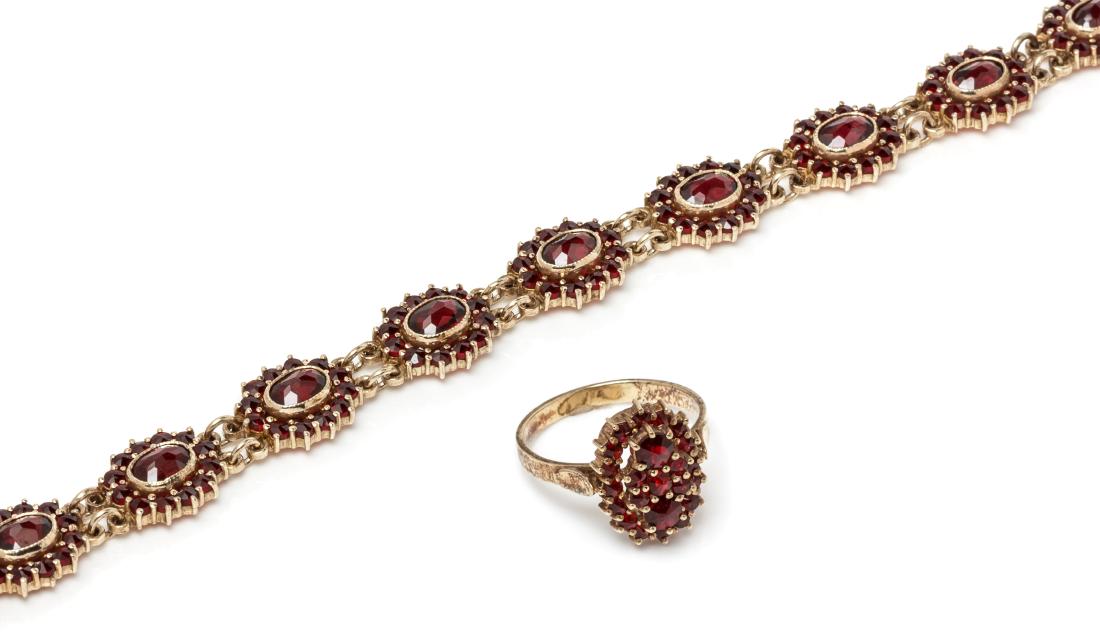 * A Gilt Silver and Paste Demi-Parure, Czechoslovakian,: * A Gilt Silver and Paste Demi-Parure, Czechoslovakian, consisting of a bracelet with a matching ring. Stamp: (Czechoslovakian hallmarks) 900. 15.20 dwts. Estimate $100-200 Property from the Estate of