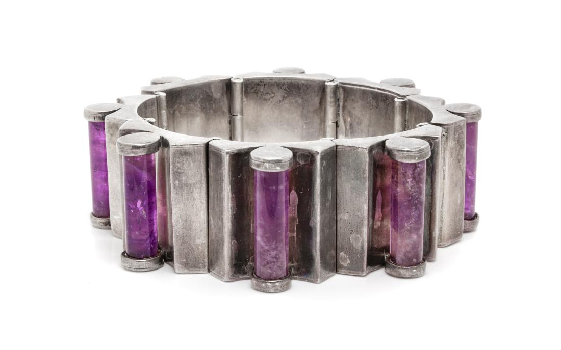 A Sterling Silver and Amethyst Bracelet, Antonio: A Sterling Silver and Amethyst Bracelet, Antonio Pineda, consisting of concave links each set with amethyst columns measuring approximately 20.10 x 6.10 mm with cable link safety chain. Stamp: SILVER 