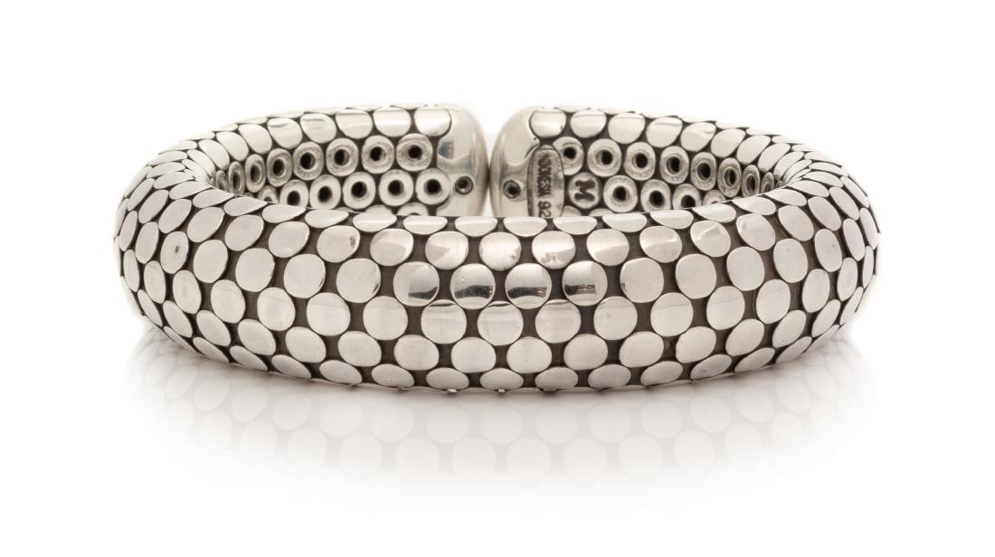 * A Sterling Silver 'Dot' Cuff Bracelet, John Hardy,: * A Sterling Silver 'Dot' Cuff Bracelet, John Hardy, measuring approximately 15.00 mm wide. Stamp: (John Hardy maker's mark) M INDONESIA 925. 48.00 dwts. Estimate $200-300 Property from The Violet Sof