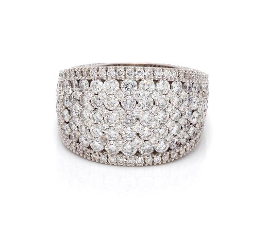 * An 18 Karat White Gold and Diamond Ring, 16.30 dwts. (1 of 2)