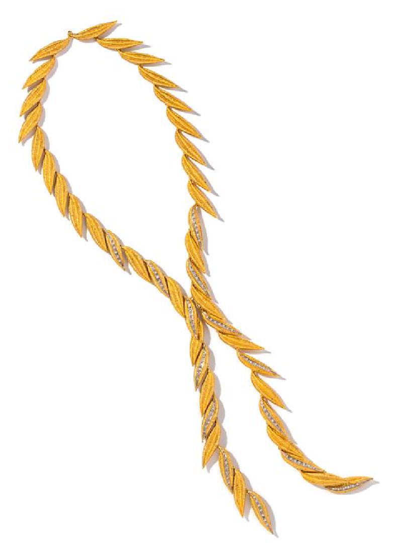 An 18 Karat Yellow Gold and Diamond Leaf Motif Lariat (1 of 1)