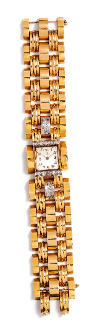 * A Retro 18 Karat Yellow Gold and Diamond Wristwatch, (1 of 1)