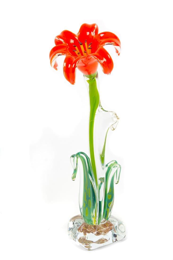 * Yaffa Sikorsky and Jeff Todd, (American), Tiger Lily: * Yaffa Sikorsky and Jeff Todd (American) Tiger Lily blown glass Height 15 1/2 inches. Estimate $100-200 Property from the Collection of Audrey A. Mann, Milwaukee, Wisconsin Repair to cracked stem