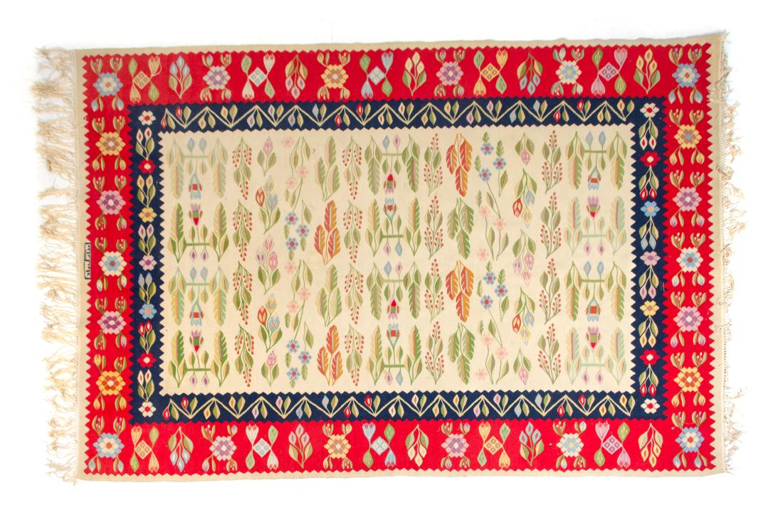 A Scandinavian Wool Rug 8 feet 11 inches x 6 feet.: A Scandinavian Wool Rug mid 20th century with foliate decoration. 8 feet 11 inches x 6 feet. Estimate $300-500