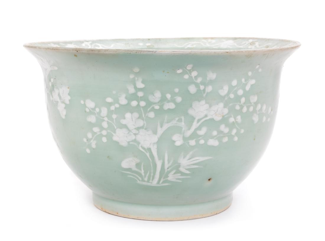 A Chinese White Slip Decorated Celadon Ground Cachepot (1 of 2)
