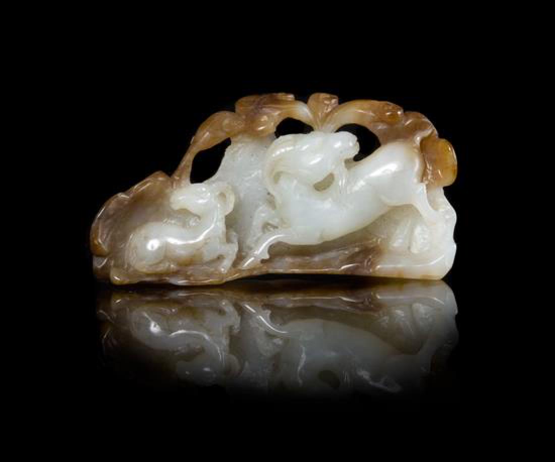 A Chinese Carved Russet and White Jade Figural Group of (1 of 1)