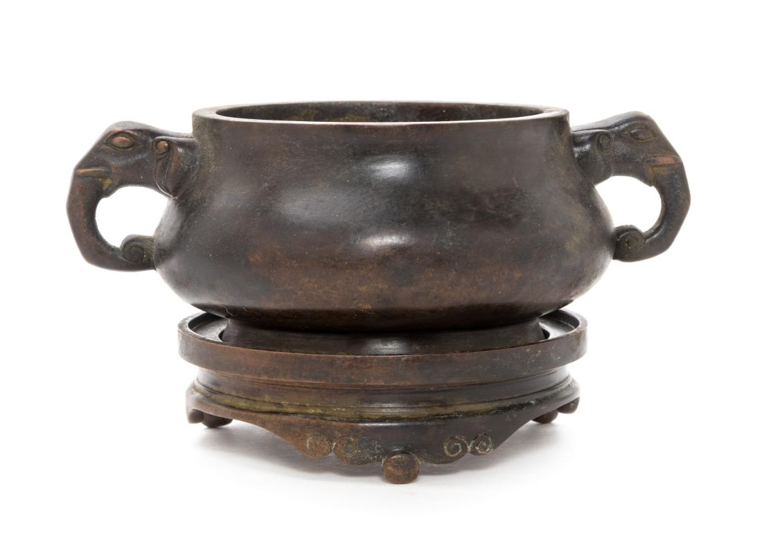 A Chinese Bronze Tripod Elephant Handled Censer (1 of 2)
