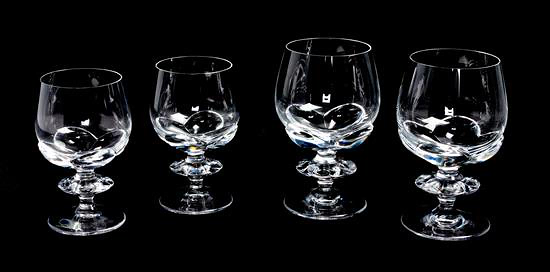 * A Group of Lalique Molded and Frosted Stemware Height: * A Group of Lalique Molded and Frosted Stemware comprising seven red wine glasses and eight white wine glasses, 15 items total. Height of taller 6 1/8 inches. Estimate $150-250 Property from the Esta