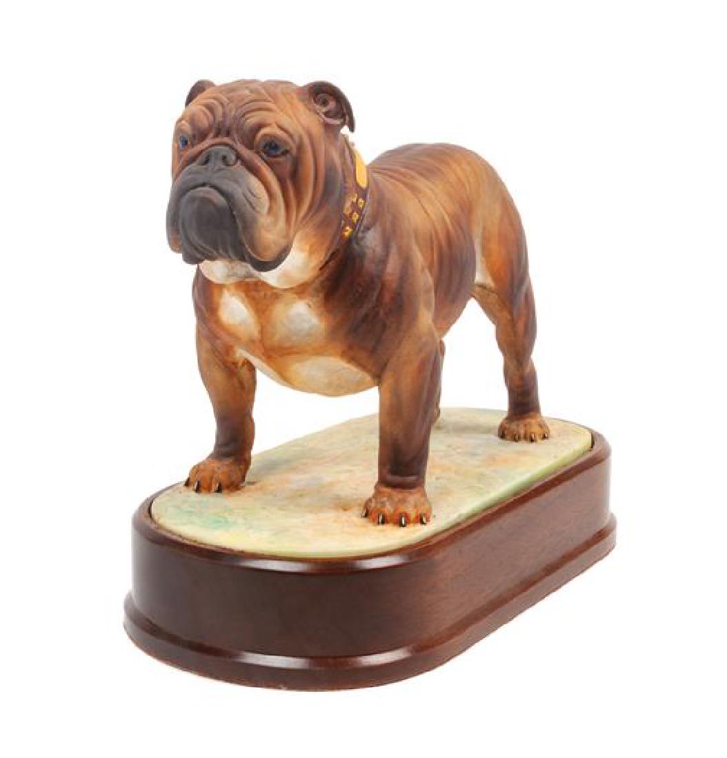* A Royal Worcester Bulldog Width 10 1/2 inches.: * A Royal Worcester Bulldog doris lindner set in wooden base. Width 10 1/2 inches. Estimate $200-300 Property from the American Kennel Club Museum of the Dog, sold for the acquisition, preservation, p