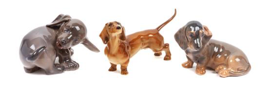 * A Group of Three Dachshund Porcelain Figures Width of (1 of 1)