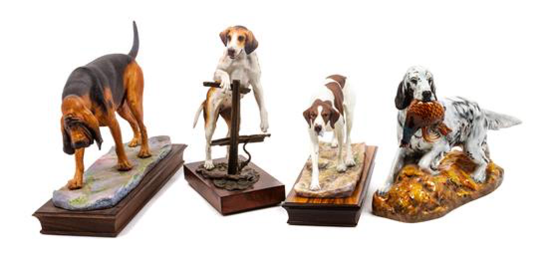 * A Group of Four Dog Figures of Various Breed Width of (1 of 1)