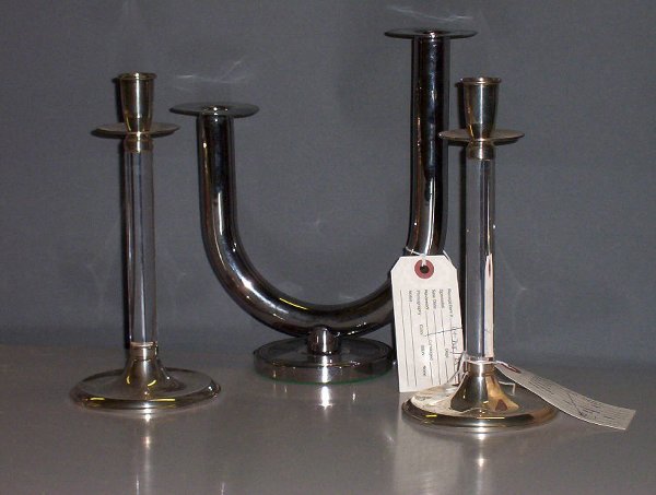 PAIR OF LUCITE AND STERLING SILVER CANDLESTICKS: PAIR OF LUCITE AND STERLING SILVER CANDLESTICKS BY REED AND BARTON H: 8 3/4 in. Together with chromed metal U form two branch candelabra. H: 9 3/4 in.
