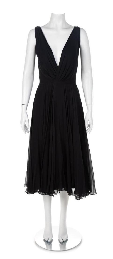 Ceil Chapman Black Silk Chiffon Dress, 1950-60s No size: Ceil Chapman Black Silk Chiffon Dress, 1950-60s Sleeveless black silk chiffon dress with gathered and pleated surplice neckline and full skirt with a black silk lining. Dress is closed down the center