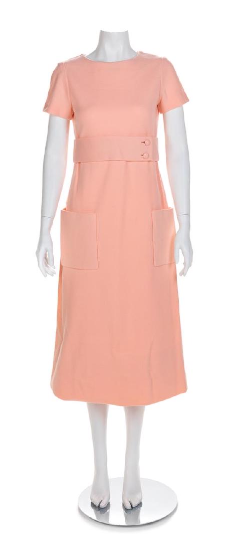 Norman Norell (Unlabeled) Pink Dress, 1960s: Norman Norell (Unlabeled) Pink Dress, 1960s Attributed to Norman Norell Estimate $100-200 The stated overall condition of the lot is based on the assumption that the wear is consistent with age and us