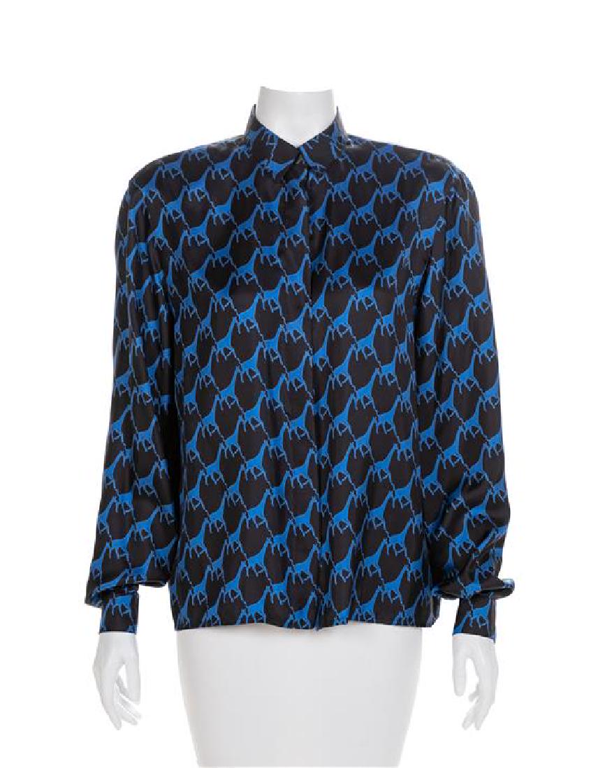 Four Blouses, 1970-90s: Four Blouses, 1970-90s Made by; Krizia (blue and black animal print), Ted Lapidus (navy), Leonard Fashion (Multicolor Geometric), KOOS Peasant Blouse (brown). Estimate $80-120