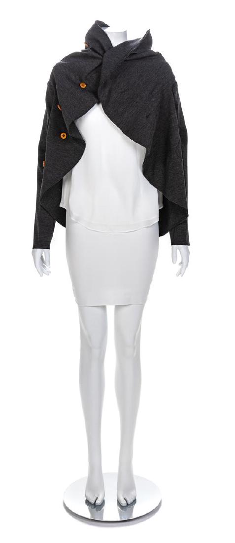 Comme des Garçons Grey Circle Knit Jacket, F/W 2002: Comme des Garçons Grey Circle Knit Jacket, F/W 2002 A sweater cut from a circle of approximately 38" in diamater of grey wool knit. Two horizontal slits are placed into the near center of the circle