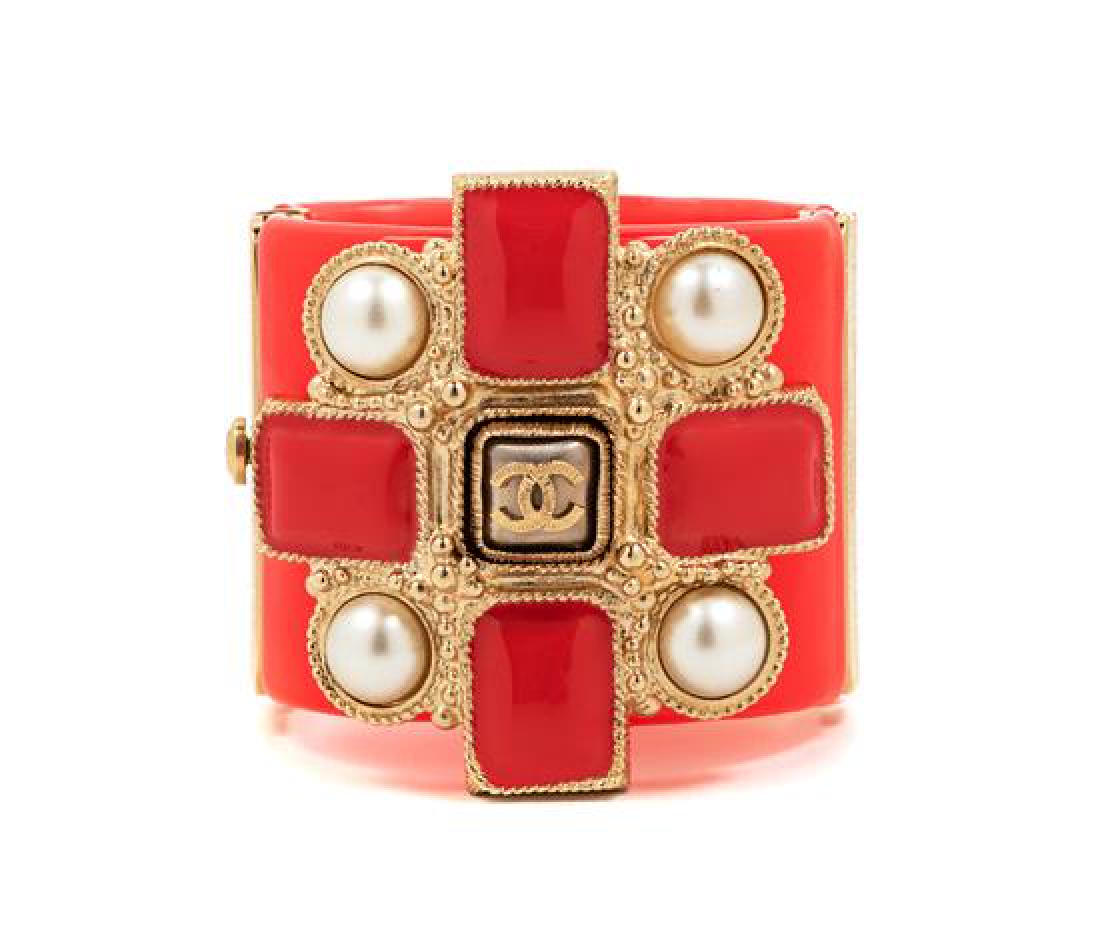 Chanel Pink Lucite Maltese Cross Cuff Bracelet, 2013: Chanel Pink Lucite Maltese Cross Wide Cuff Bracelet, 2013 goldtone hardware, pink resin with center maltese cross featuring raised CC logo at center, pink enamel and round faux pearls, with a goldtone