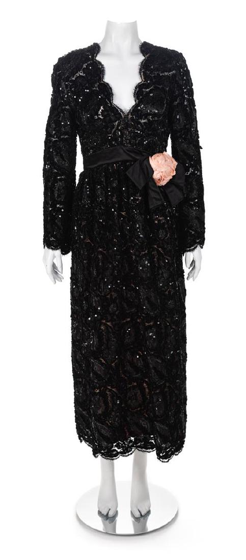 Donald Brooks Chenille Sequin Dress, 1970 No size label: Donald Brooks Chenille Sequin Dress, 1970 Floor length black chenile, mylar and sequin lace dress underlined with a peach fabric and cut with a crew neckline, long flared sleeves and straight skirt ga