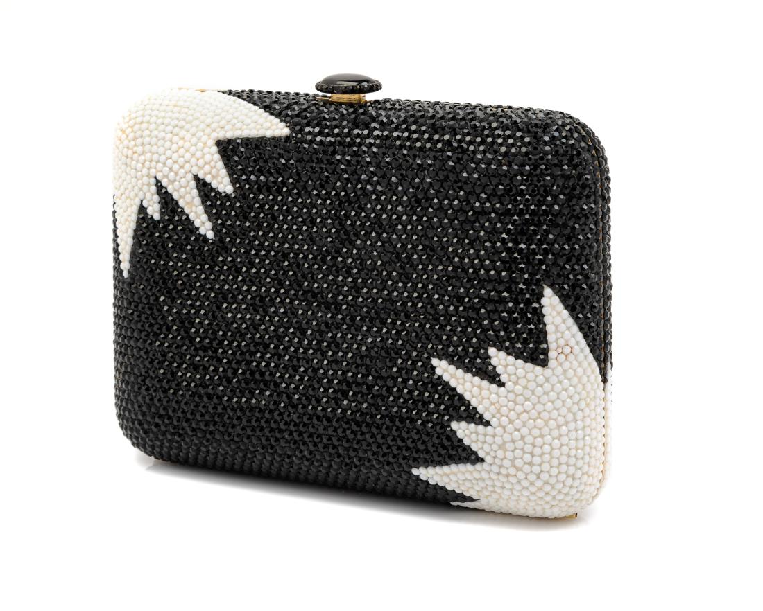 * Judith Leiber Black and White Jeweled Clutch: * Judith Leiber Black and White Jeweled Clutch, goldtone hardware, gold interior with a push button closure, chain shoulder strap, together with a silvertone mirror. Label: Judith Leiber © Estimate $