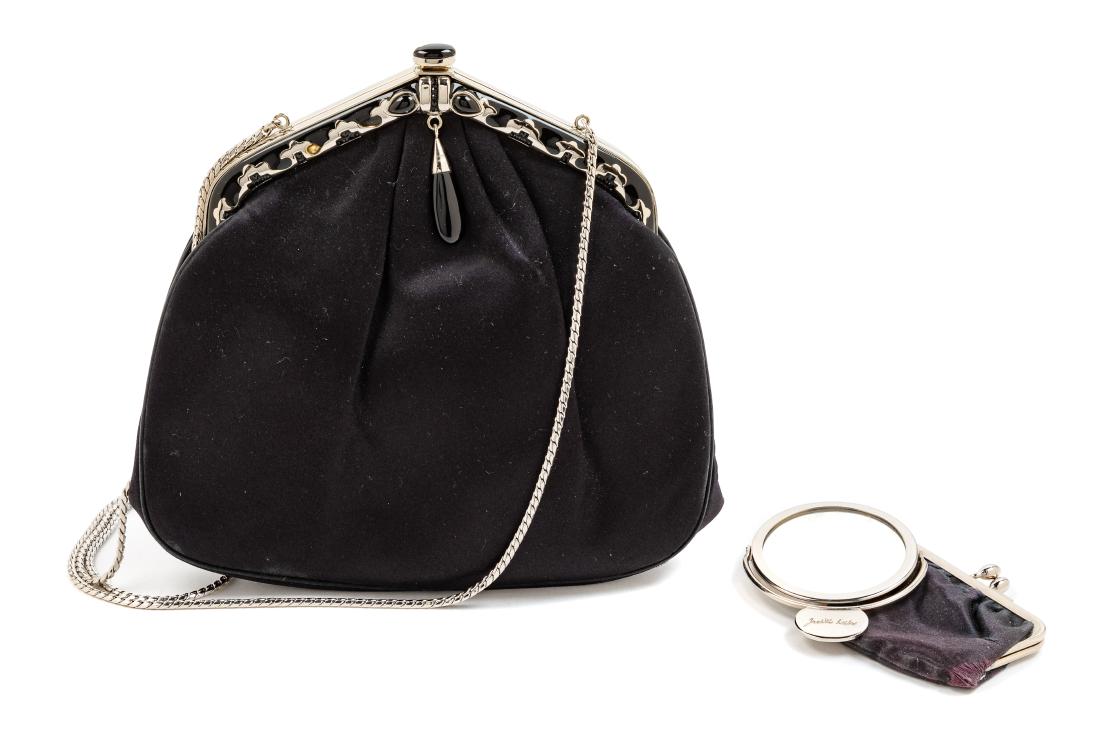 Judith Leiber Black Satin Bag: Judith Leiber Black Satin Bag With coin purse, mirror and dustbag. Estimate $80-120 The stated overall condition of the lot is based on the assumption that the wear is consistent with age and use. As