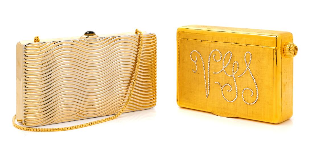 * Two Judith Leiber Gilt Metal Clutches: * Two Judith Leiber Gilt Metal Clutches First: Rectangular goldtone with wave design and goldtone clasp with black glass. Goldtone strap and gold leather lining. Label: Judith Leiber © Second: Rectan