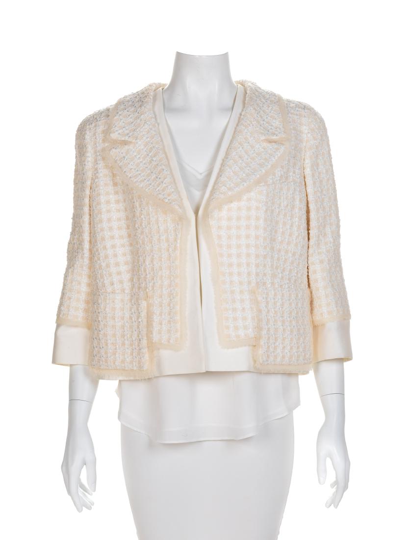 Oscar de la Renta Cream Jacket, 2000s Size label: 12: Oscar de la Renta Cream Jacket, 2000s Cotton and nylon blend jacket with a check pattern, notched collar, patch pockets and open front lined with a white fabric. Label: Oscar de la Renta / Made in Ita