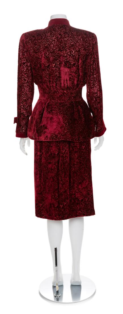 Thierry Mugler Voided Velvet Jacket and Skirt, 1990s: Thierry Mugler Voided Velvet Jacket and Skirt, 1990s Jacket is made with a v-neckline, long sleeves and a center front snap closure. The jacket is trimmed with red velvet and fashioned into bows at th