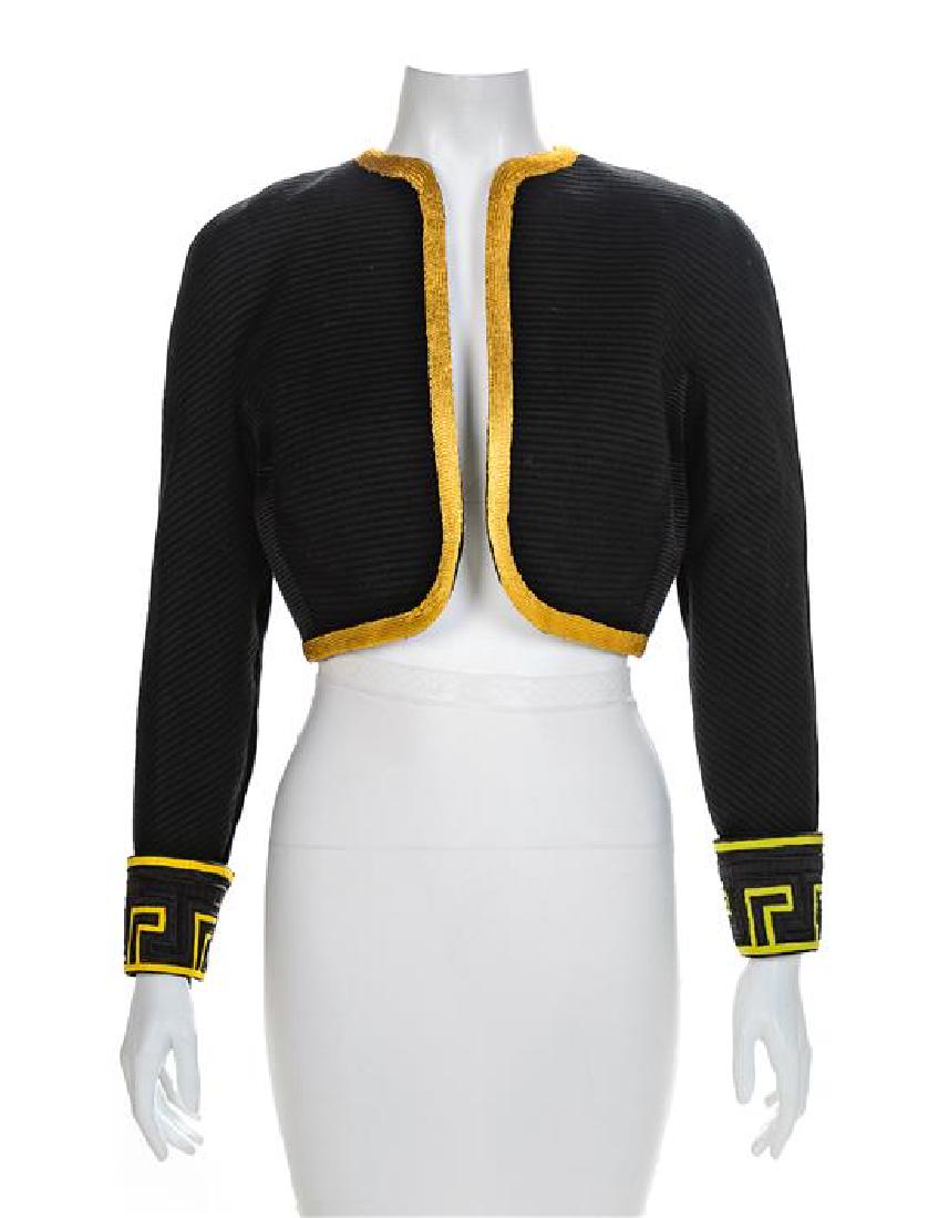 Atelier Versace Black Jacket with Yellow Trim, 1990s: Atelier Versace Black Jacket with Yellow Trim, 1990s Black silk jacket with horizontal ribbing on front and black silk velvet on back. The jacket has a crew neckline, long sleves with embroidered cuff