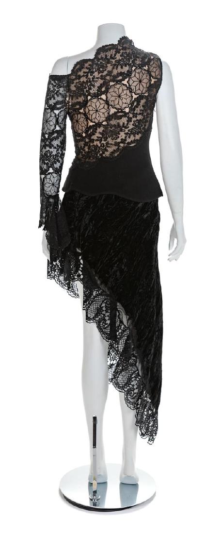 Atelier Versace Black Lace Top with Black Velvet and: Atelier Versace Black Lace Top with Black Velvet and Lace Skirt, 1990s Black lace top with a nude lining and a left flared sleeve only. Scalloped hip panel of black crepe with a side zip closure. Esti