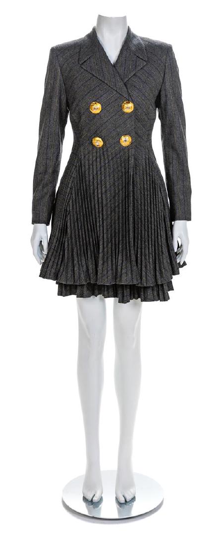 Atelier Versace Grey Jacket with Pleated Peplum and: Atelier Versace Grey Jacket with Pleated Peplum and Matching Pleated Skirt, 1990s Black and grey wool herringbone with black and yellow stripes. Lined jacket has a notched lapel, long sleeves with sho