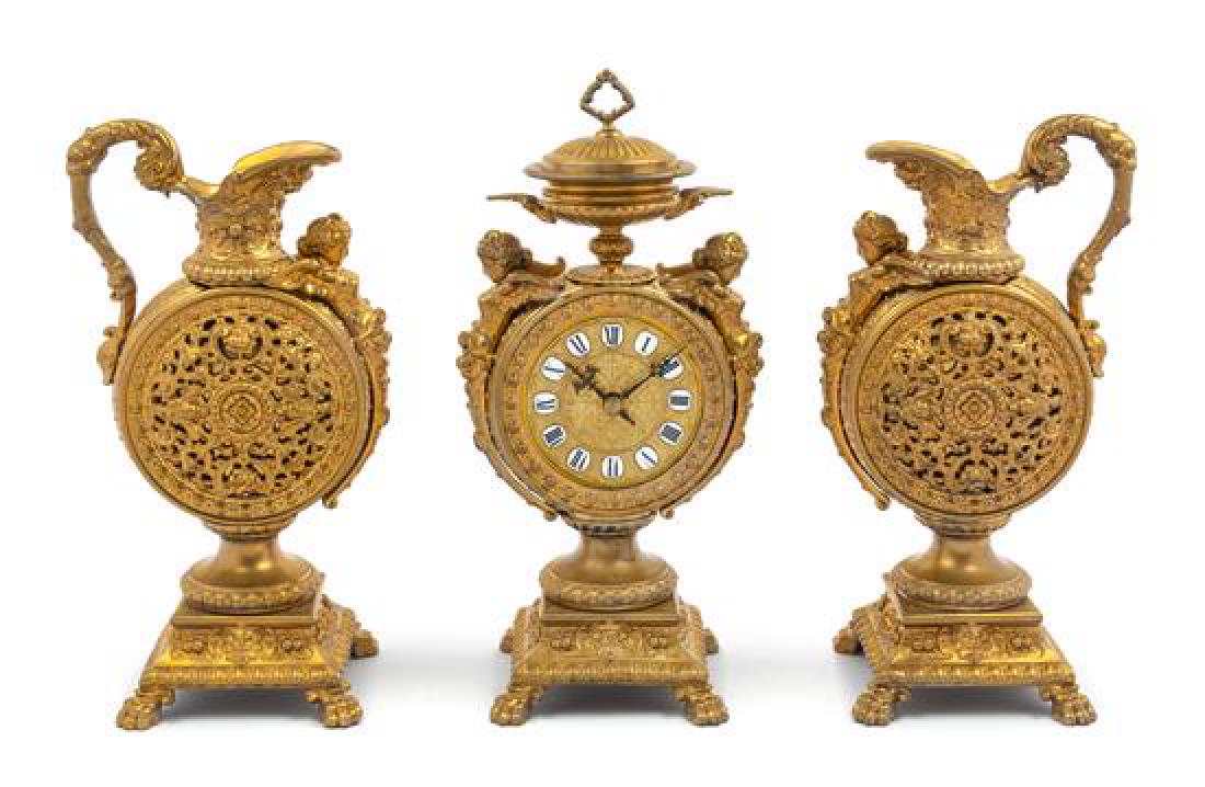 * A French Neoclassical Gilt Metal Clock Garniture (1 of 1)