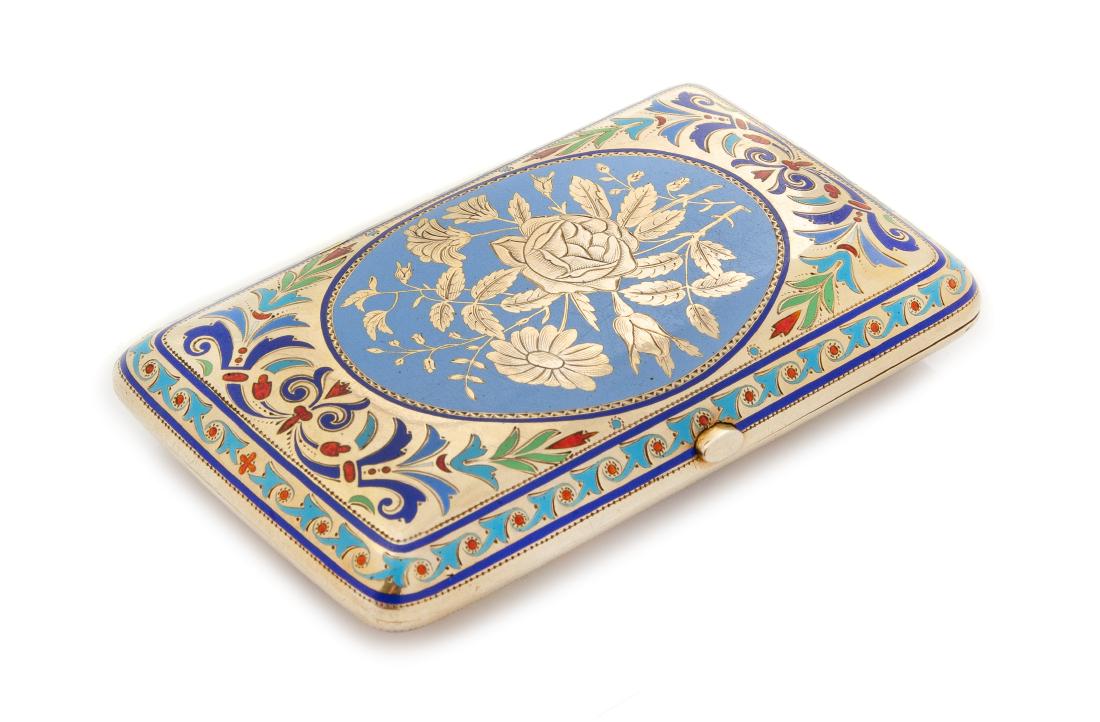 * A Russian Silver and Enamel Cigarette Case, Mark of: * A Russian Silver and Enamel Cigarette Case Mark of Grachev Brothers with Imperial Warrant, St. Petersburg, Late 19th/Early 20th Century the case centered with an engraved floral spray against a ligh